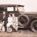 Lovely photo of family outing. I guess the vintage of car dates it to the 1930s or 1940s