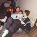 Theresa, Crispy and Steve-O thrash around on the sofa