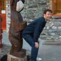Tim sticks his arse into a wooden bear
