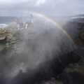 A rainbow is formed as spray blasts up though the 'Puffin' Hole'
