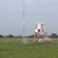 A stray lifeguard watch-tower has been left by the runway