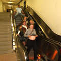 The gang mess around on the escalators