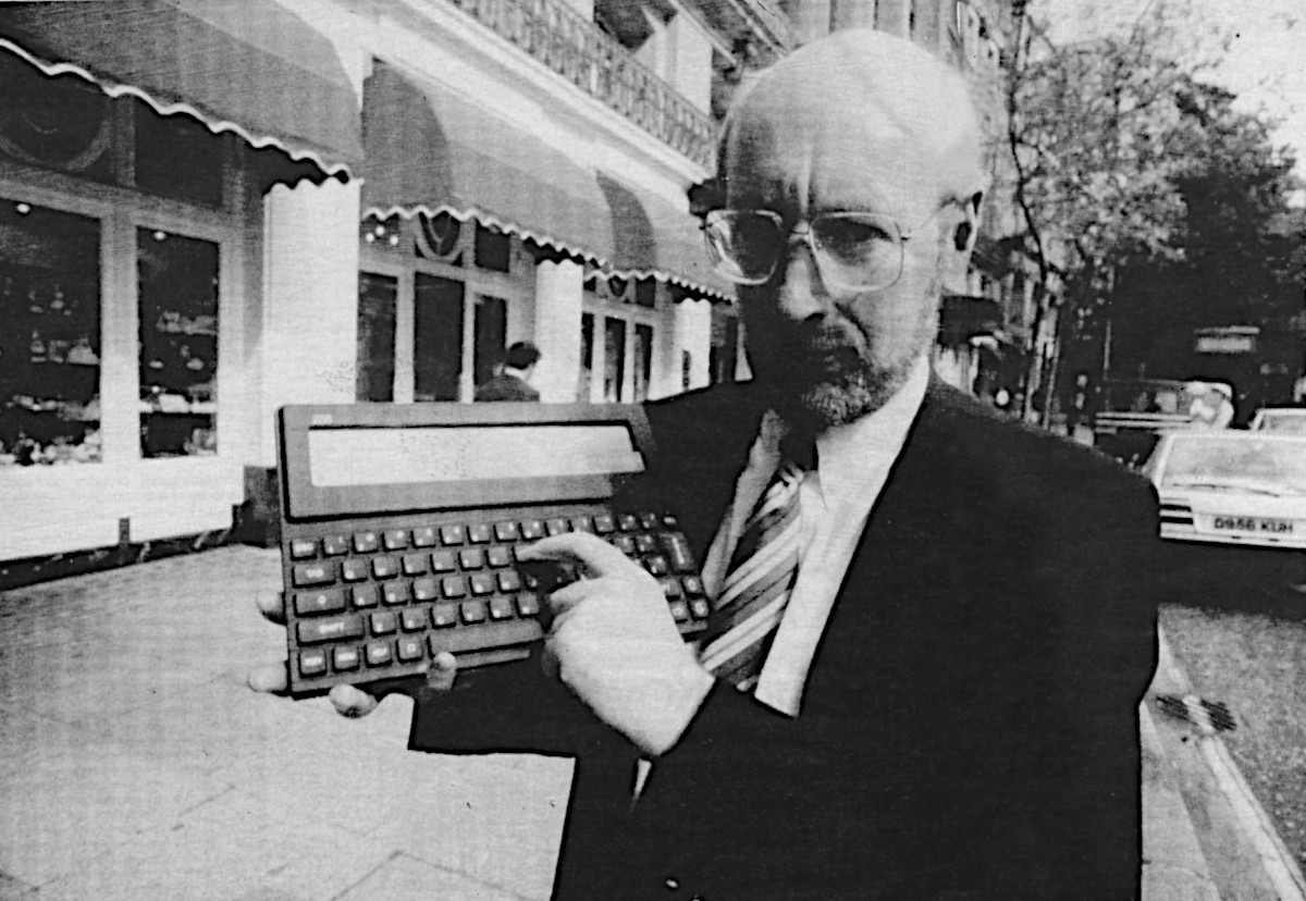 Clive Sinclair and his Z88 outside a hotel in the UK somewhere. From Your Computer, December 1987