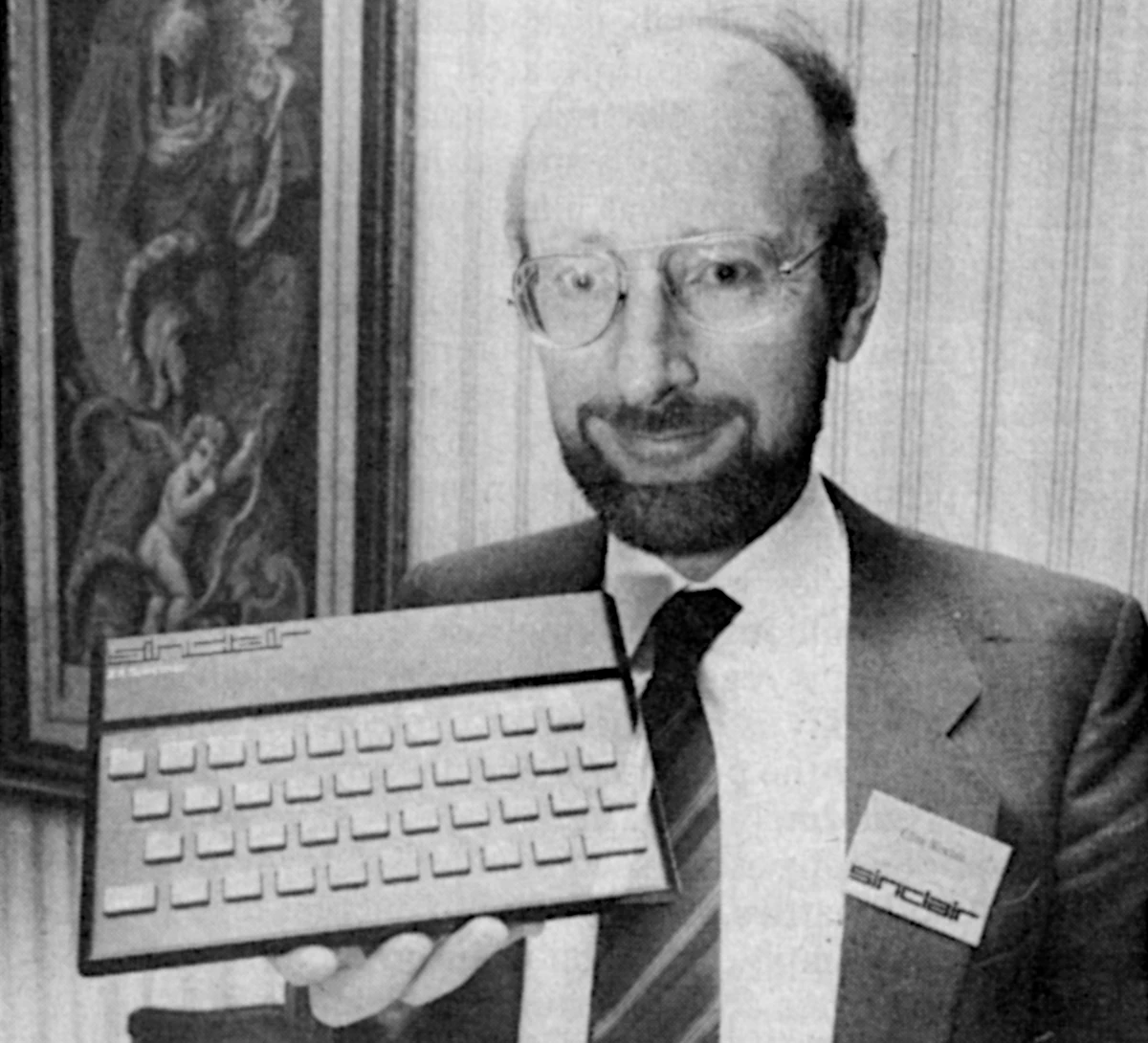 Clive Sinclair holds up his baby at the launch event for the ZX Spectrum, held at the Churchill Hotel on the 23rd April 1982. From Practical Computing, November 1982 Clive Sinclair holds up his baby at the launch event for the ZX Spectrum, held at the Churchill Hotel on the 23rd April 1982. From Practical Computing, November 1982