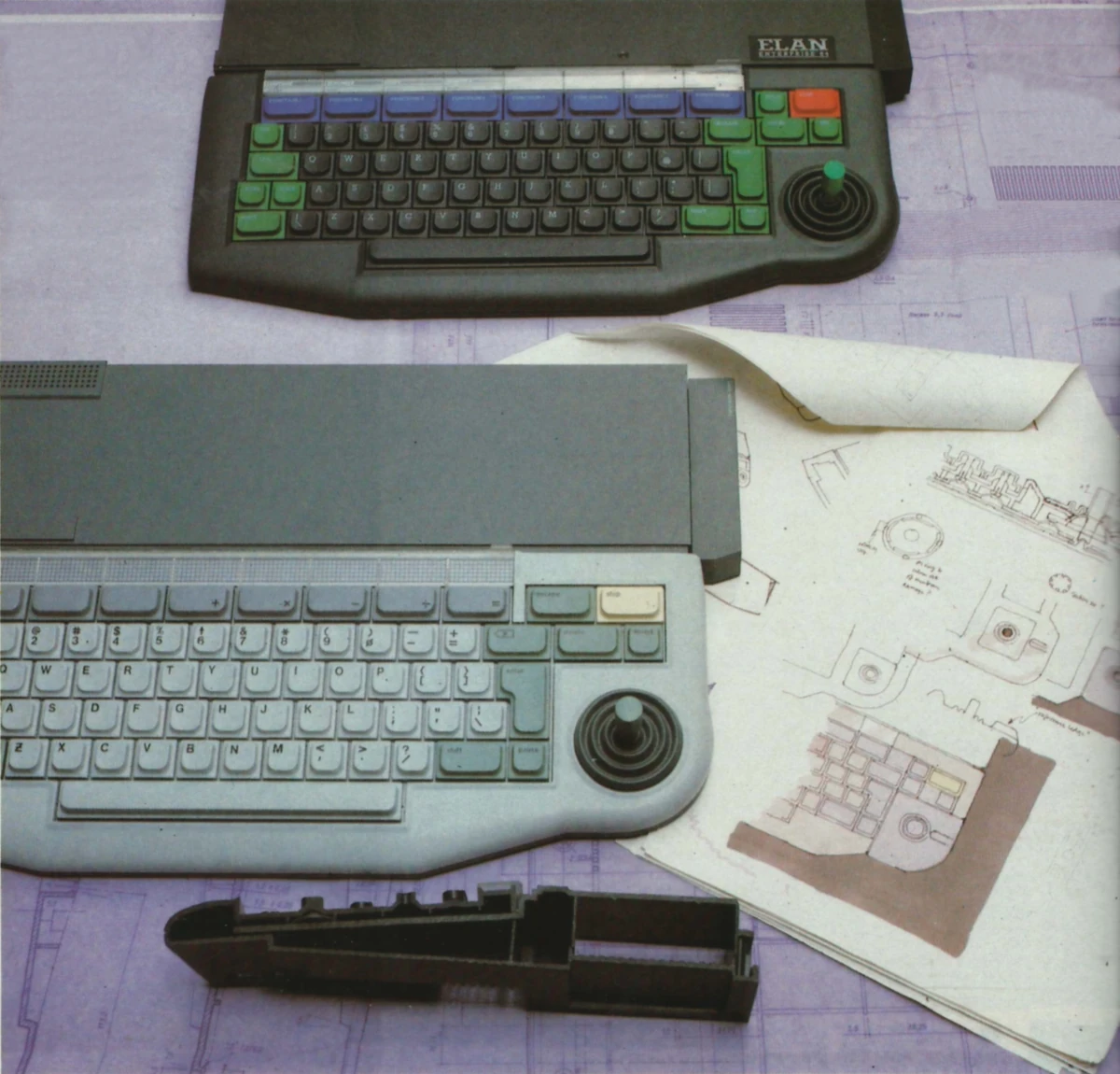 The finalised Elan, along with its original two-tone grey prototype, below. From Your Computer, January 1984