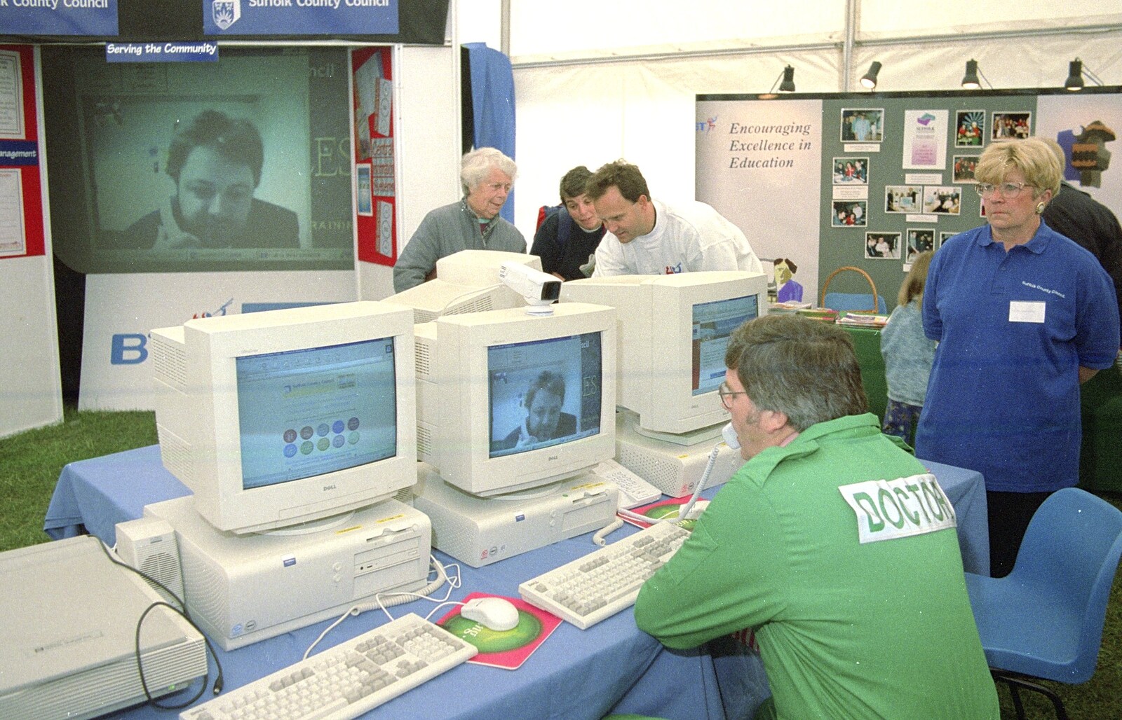 Suffolk County Concillor Chris Mole video-conferences with a Doctor in a tent in a field at the Suffolk Show in 1997. The video is running over a temporary ISDN line installed by BT for the occasion. The system was also used by a deaf group and it enabled them to use sign language with people not in line of sight for the first time ever.