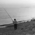 Some dude fishes off Barton beach, Life in Ford Cottage and Barton on Sea, Hampshire - 2nd April 1985