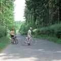 John and Andy on the road around the resevoir, Uni: A Burrator Bike Ride, Dartmoor - 20th June 1989