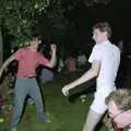 Dav and Sean lob balls around the garden, Chris and Phil's Party, Hordle, Hampshire - 6th September 1989