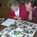 DH looks over some old photos, Golden Jubilee Celebrations, The Village Hall, Brome, Suffolk - 4th June 2002