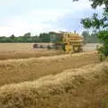 A New Holland combine rumbles past, BSCC Rides, Petanque at the Swan and July Miscellany - 21st July 2002