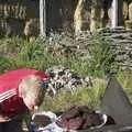 Bill blows on some singed burgers, A Rabbit Barbeque, Dairy Farm, Thrandeston - 14th September 2003