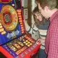 Marc does the fruit machine, The Swan's Cellar, and Bill's Mambo Night at the Barrel, Banham, Norfolk - 6th February 2004