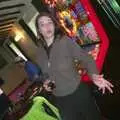 Jen by a fruit machine, The BSCC Easter Bike Ride, Thelnetham and Redgrave, Suffolk - 10th April 2004