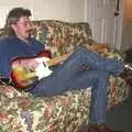 Rob twangs his Telecaster to get warmed up, The BBs do Gissing Hall, and a Night in the Garden, Brome, Suffolk - 14th May 2004
