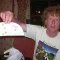 Wavy holds up his creation, Wavy's Birthday at the Swan Inn, Brome, Suffolk - 24th May 2004