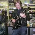Rob McVey has a quick pouty twang on his guitar, Longview play Revolution Records, Diss, Norfolk - 2nd July 2004