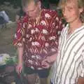 Bill and Jimmy poke the barbeque, The BSCC in Debenham, and Bill's Housewarming Barbie, Yaxley, Suffolk - 31st July 2004