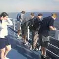 Everyone peers over the side of the ferry, A Brome Swan Trip to Calais and the Battery Todt, Cap Gris Nez, France - 11th August 2004