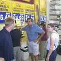 Paul, Alan and Claire look for wedding wine, A Brome Swan Trip to Calais and the Battery Todt, Cap Gris Nez, France - 11th August 2004