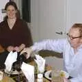 Hannah looks over as Julian pours the wine, The BBs do Bressingham and a Night in Elsworth, Norfolk and Cambridge - 17th December 2004