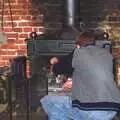 The Boy Phil pokes the fire, Sausages at the Swan Inn, and Revs Gets Decorated, Diss and Brome - 7th January 2005
