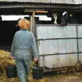 Wavy carries some buckets to the sheds, Wavy and the Milking Room, Dairy Farm, Thrandeston, Suffolk - 28th March 2005