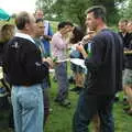 John chats to someone, Qualcomm goes Punting on the Cam, Grantchester Meadows, Cambridge - 18th August 2005