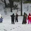 A kid emulates his snowman, California Snow: San Bernadino State Forest, California, US - 26th March 2006