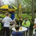 A waitress comes over to sort the parasols out, The BSCC does The Pheasant Hotel, Kelling, Norfolk - 6th May 2006