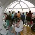 Isobel peers out from inside the capsule, A Trip on the London Eye and Bill's BBQ, London and Suffolk - 21st July 2006