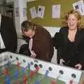 A vigorous game of table footie is underway, Qualcomm Cambridge's Christmas Do, Jesus College, Cambridge - 20th December 2006