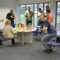 The new team gather around for lunchtime nibbles, Taptu Moves Offices: Crossing Milton Road, Cambridge - 19th February 2007