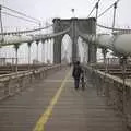 A bicycle is pushed across Brooklyn Bridge, Crossing Brooklyn Bridge, New York, US - 26th March 2007