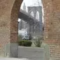 The bridge through a brick archway, Crossing Brooklyn Bridge, New York, US - 26th March 2007