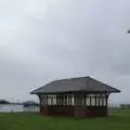 A seagull flies over the rain-swept shelter, Nosher's Birthday Trip, New Milton, Hampshire - 26th May 2007