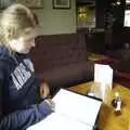 Isobel scopes the menu in the Cat and Fiddle, Driving a Racing Car, Three Sisters Racetrack, Wigan, Lancashire - 24th June 2008
