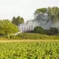 Only burnt timber uprights remain, A Fire at Valley Farm, Thrandeston, Suffolk - 24th June 2009