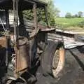 Fred gets a look at the burned-out tractor, A Fire at Valley Farm, Thrandeston, Suffolk - 24th June 2009