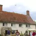 Maurice Hammond's Stearman bumbles over the house, The Brome Village Fête, Brome, Suffolk - 4th July 2009