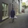 Some dude carries bags of fish round the back streets, A Trip to Dingle, County Kerry, Ireland - 21st July 2009