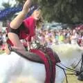 One half of 'Jive Pony' leaps on to their horse, The Eye Show and the Red Arrows, Palgrave, Suffolk - 31st August 2009