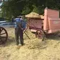 Straw is raked up, The Eye Show and the Red Arrows, Palgrave, Suffolk - 31st August 2009