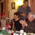 Alan reaches behind the curtain, The BSCC Christmas Dinner, The Swan Inn, Brome, Suffolk - 5th December 2009