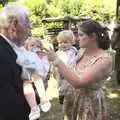 Isobel meets another baby, Clive and Suzanne's Wedding, Oakley and Brome, Suffolk - 10th July 2010
