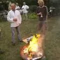 The fire gets going, Nigel and Gail's Anniversary Bash, Thrandeston Great Green, Suffolk - 24th July 2010