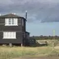 Dark clouds and a house on stilts, A Trip to Walberswick, Suffolk - 12th September 2010