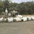 Wood for charcoal is sold by the roadside, Nairobi and the Road to Maasai Mara, Kenya, Africa - 1st November 2010