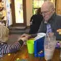 Fred and Grandad play dominos in Amandines, A Trip To The Coast, Walberswick, Suffolk - 20th March 2011