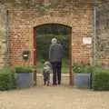 Fred and the Old Chap exit the walled garden, A Trip To The Coast, Walberswick, Suffolk - 20th March 2011